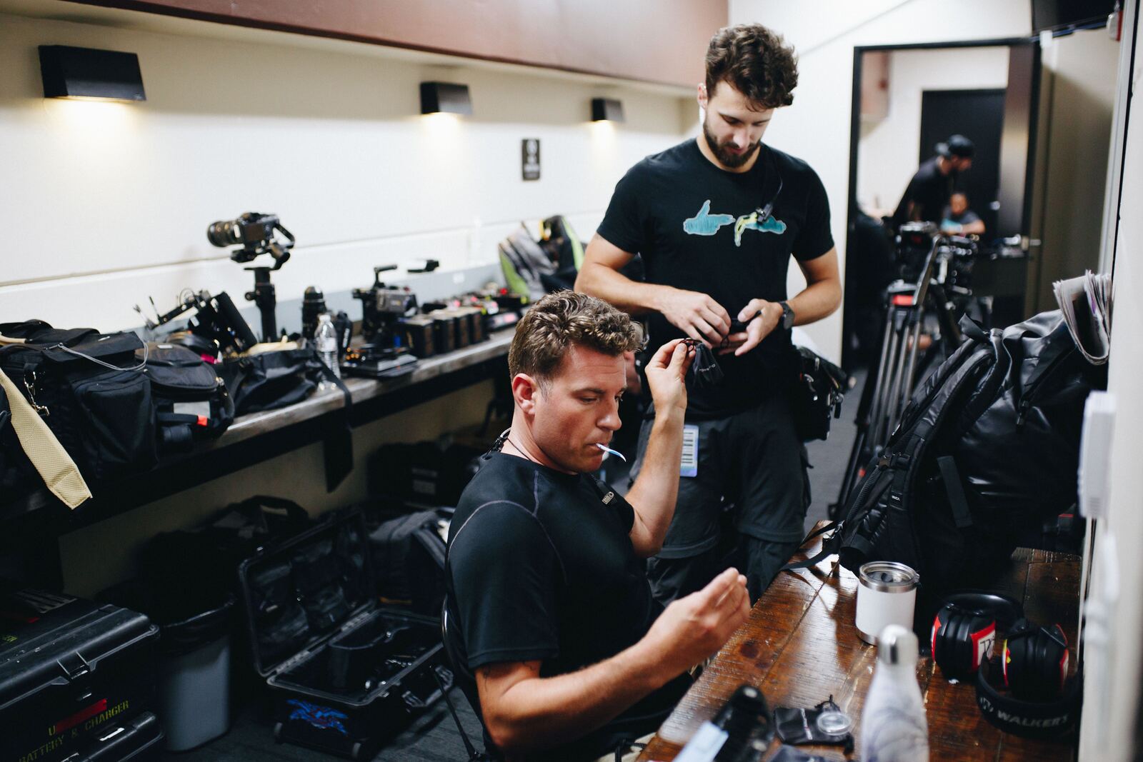 Crew prepping cameras backstage